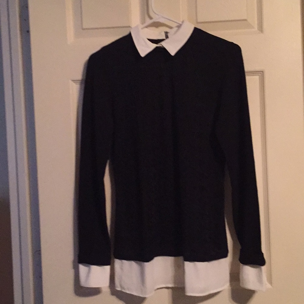 Black sweater with white collar and cuffs